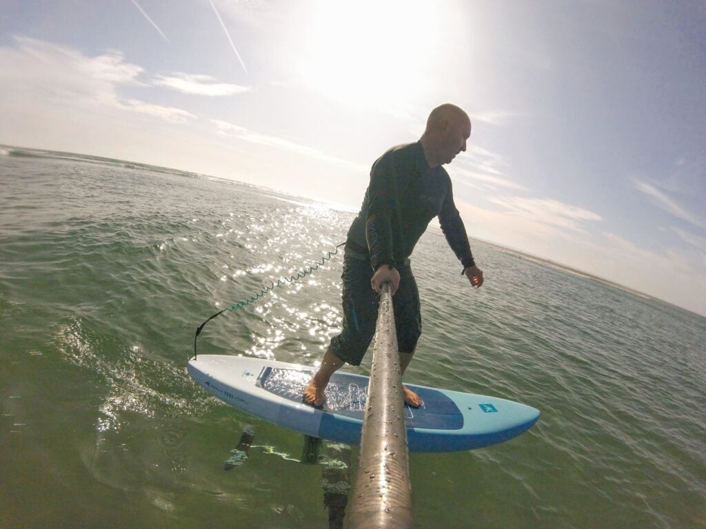 SUP foiling sur des planches de wing foiling.